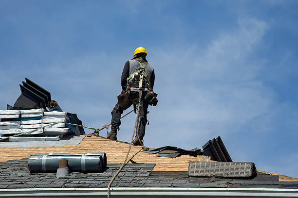 Professional Gutter Installation technician working in Conway, NH